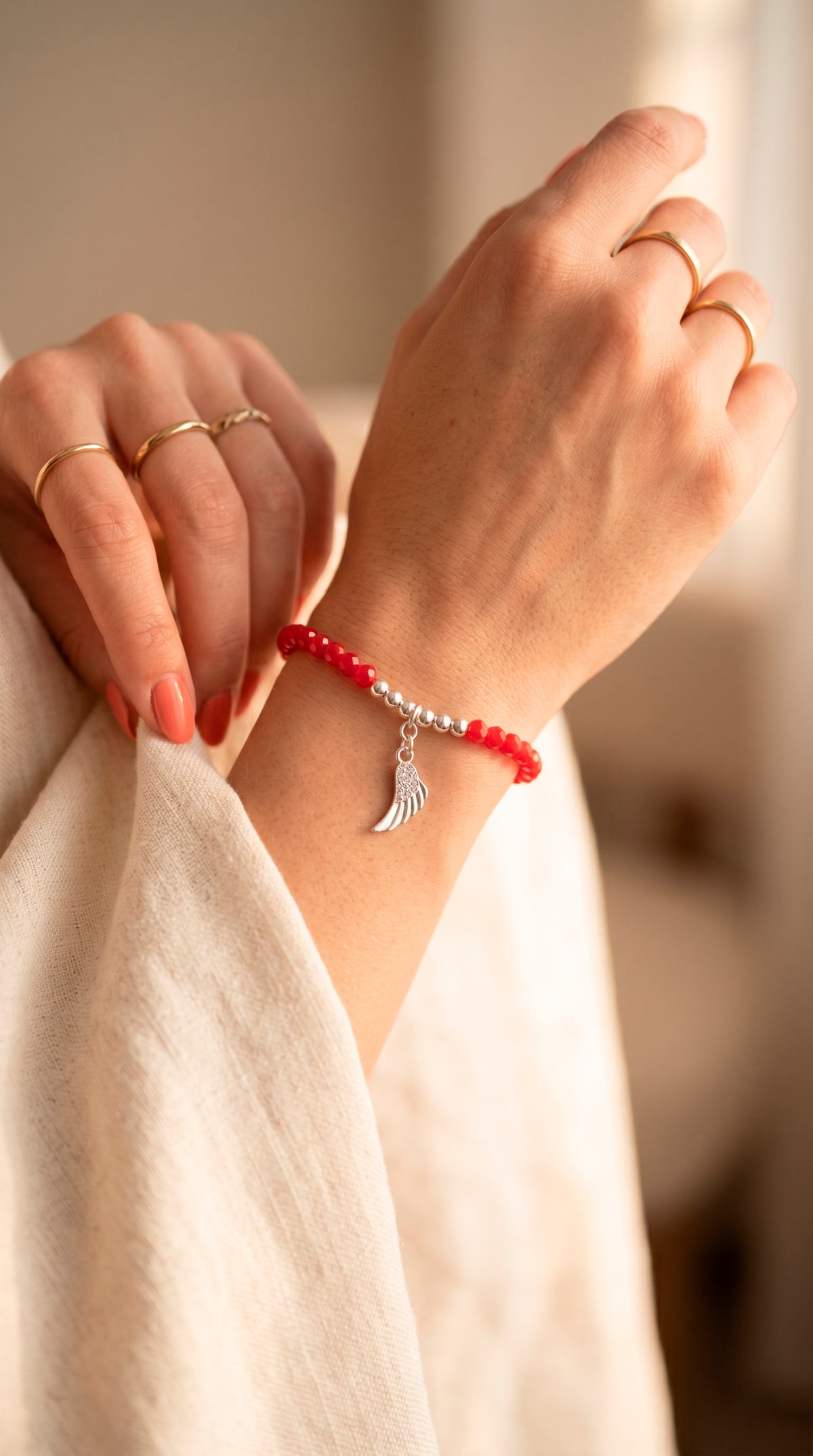 Pulsera Cristales Rojos + Dije Ala Enchape Plata