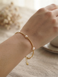 Pulsera Mostacillas y Perlas de Rio Enchape Oro