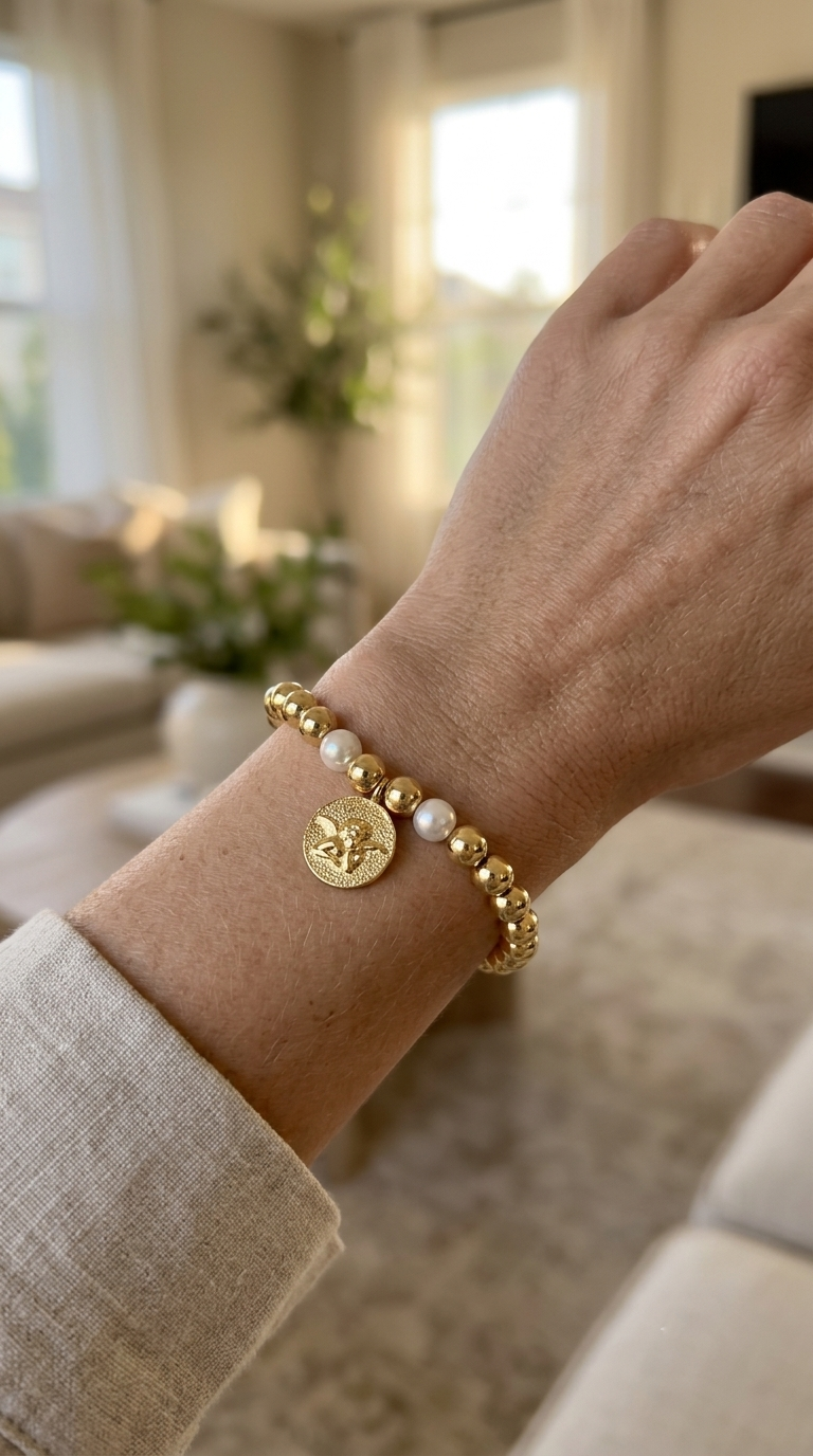 Pulsera Balines, Perla Shell y Ángel Enchape Oro