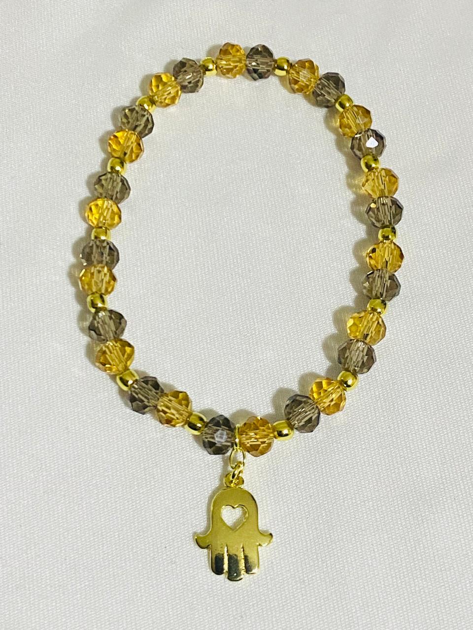 Pulsera Cristales y Dije Manito Enchape Oro