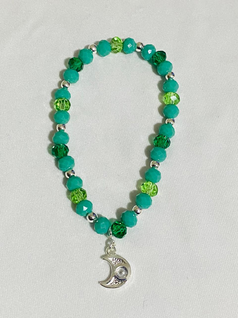 Pulsera Cristales Verde Turquesa y Dije Luna enchape Plata